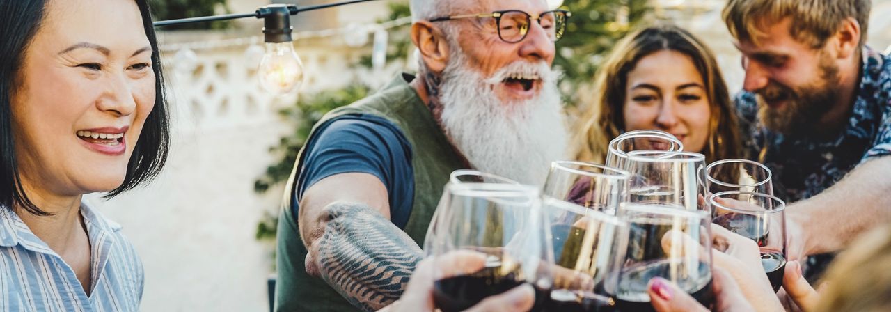A family together outside their Vrbo vacation rental